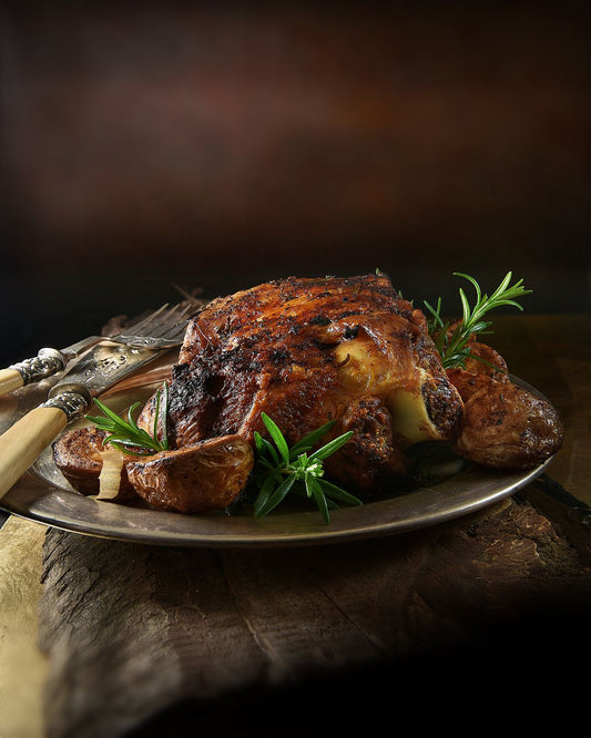 SLOW-ROASTED LAMB SHOULDER WITH GARLIC AND ROSEMARY